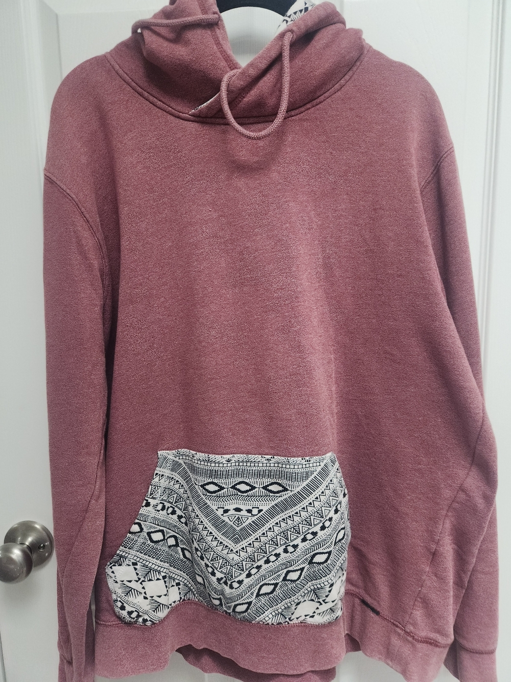 on the byas Dusty Rose Hoodie with Black & White Patterned Pocket